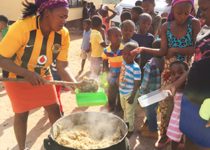 Woman cooking food for children – 01-EF