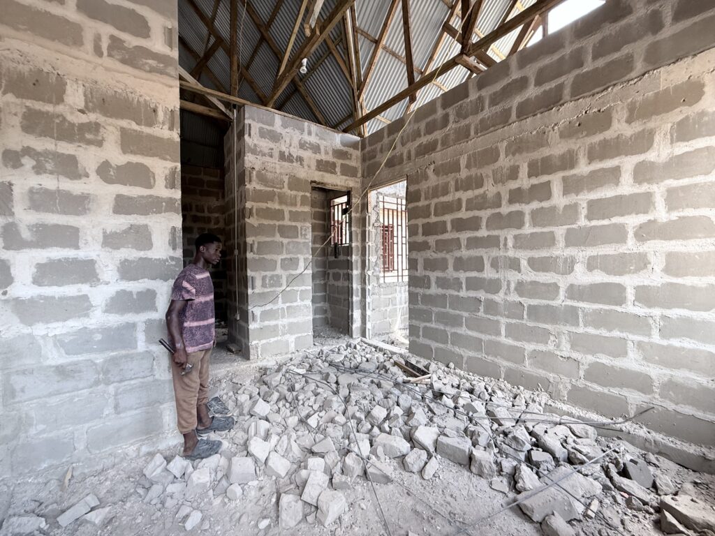 Unfinished rooms and corridors inside the new medical clinic in Kiromo, Tanzania.